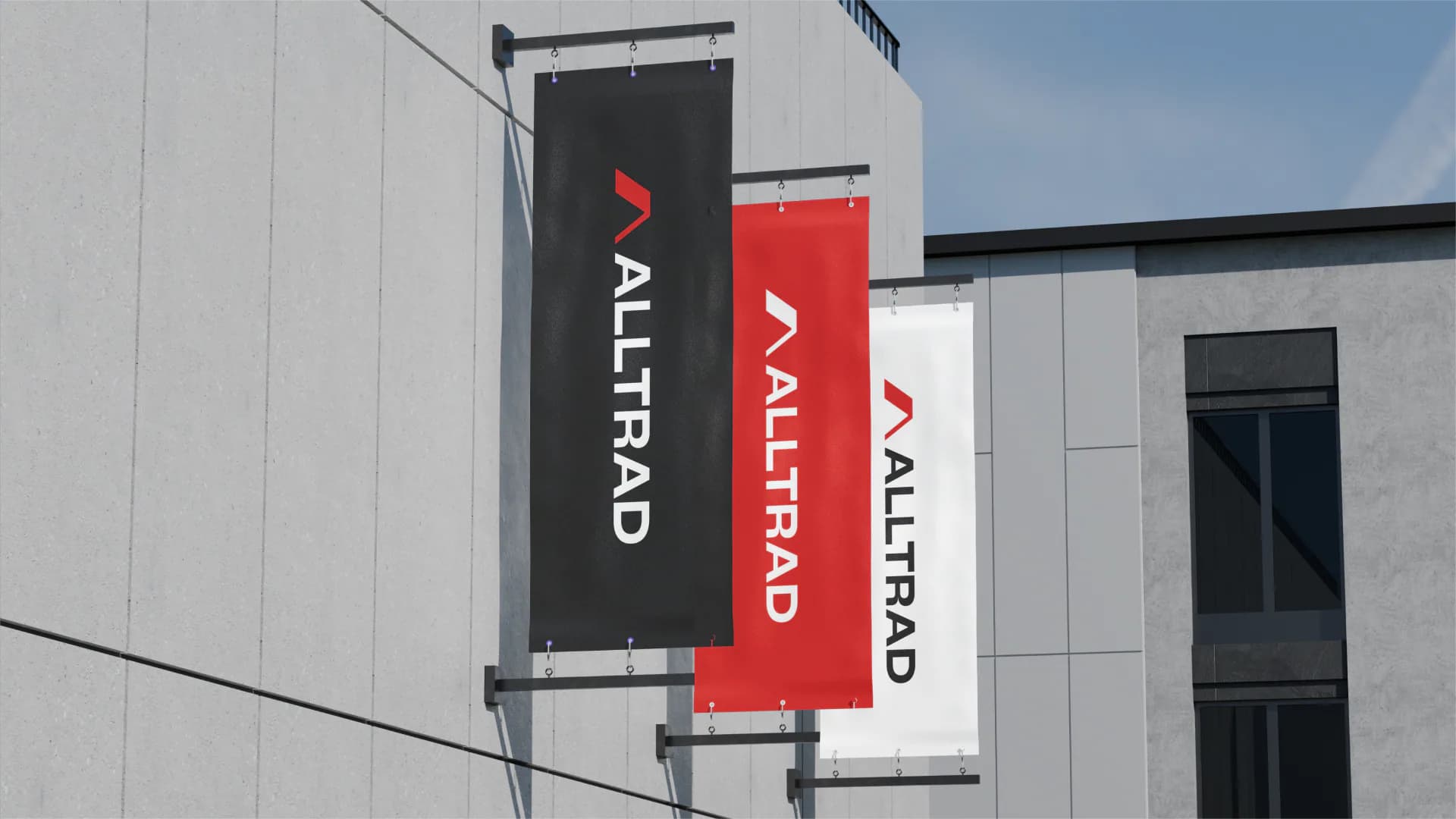 Alltrad Roofing branded flags mounted on a building