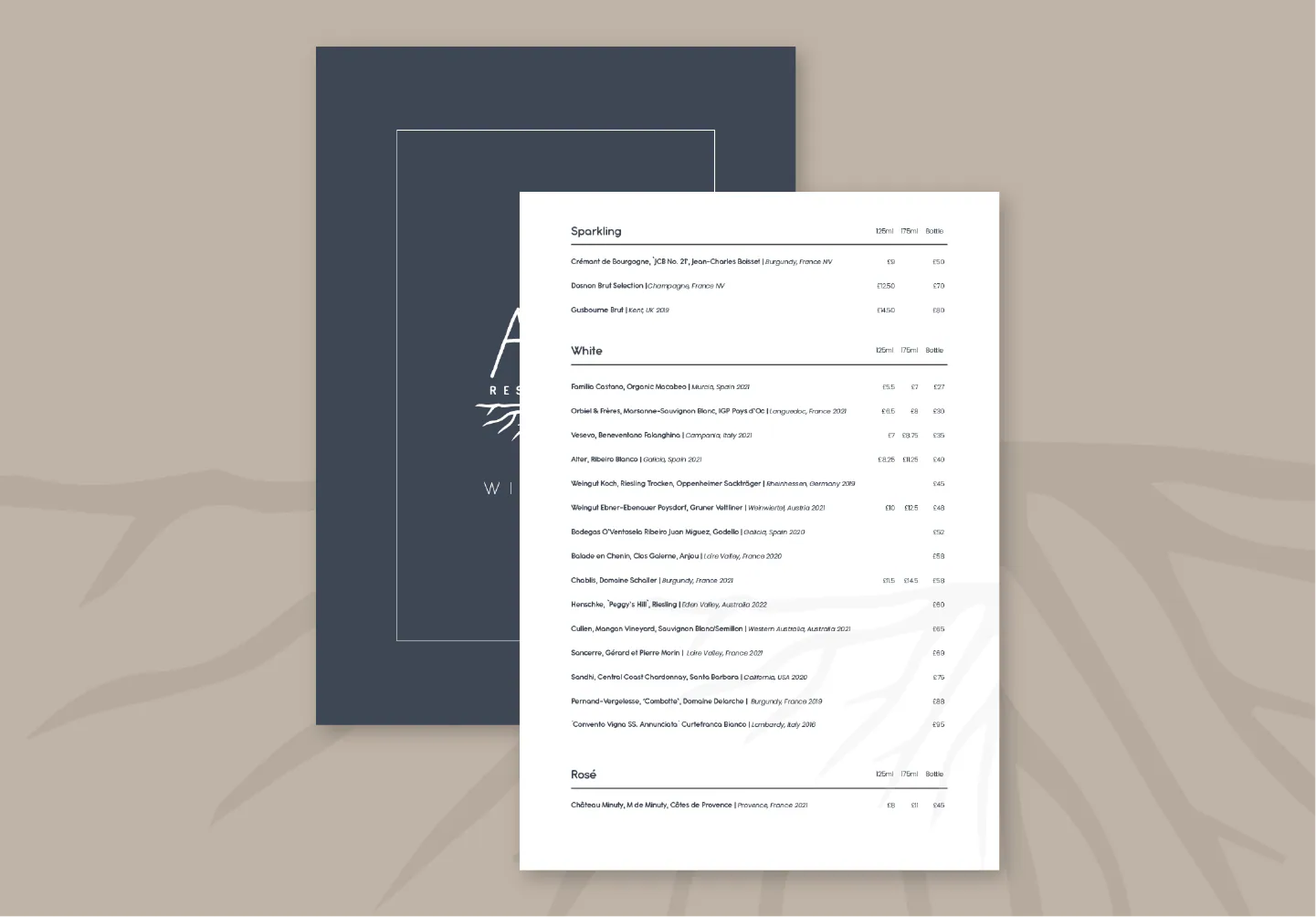 AO restaurant printed menu with the root-inspired brand mark