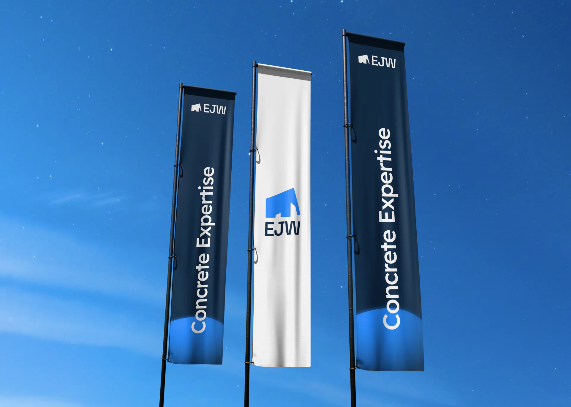 EJW Concrete Structures branded flags against a blue sky