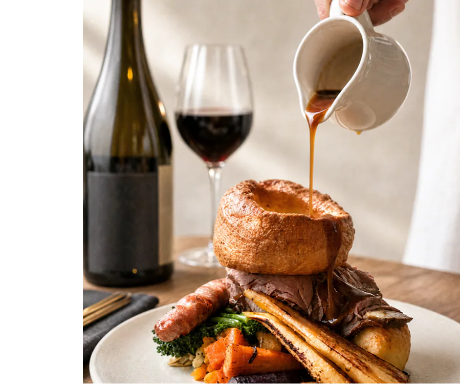 Latimers Sunday roast with gravy being poured