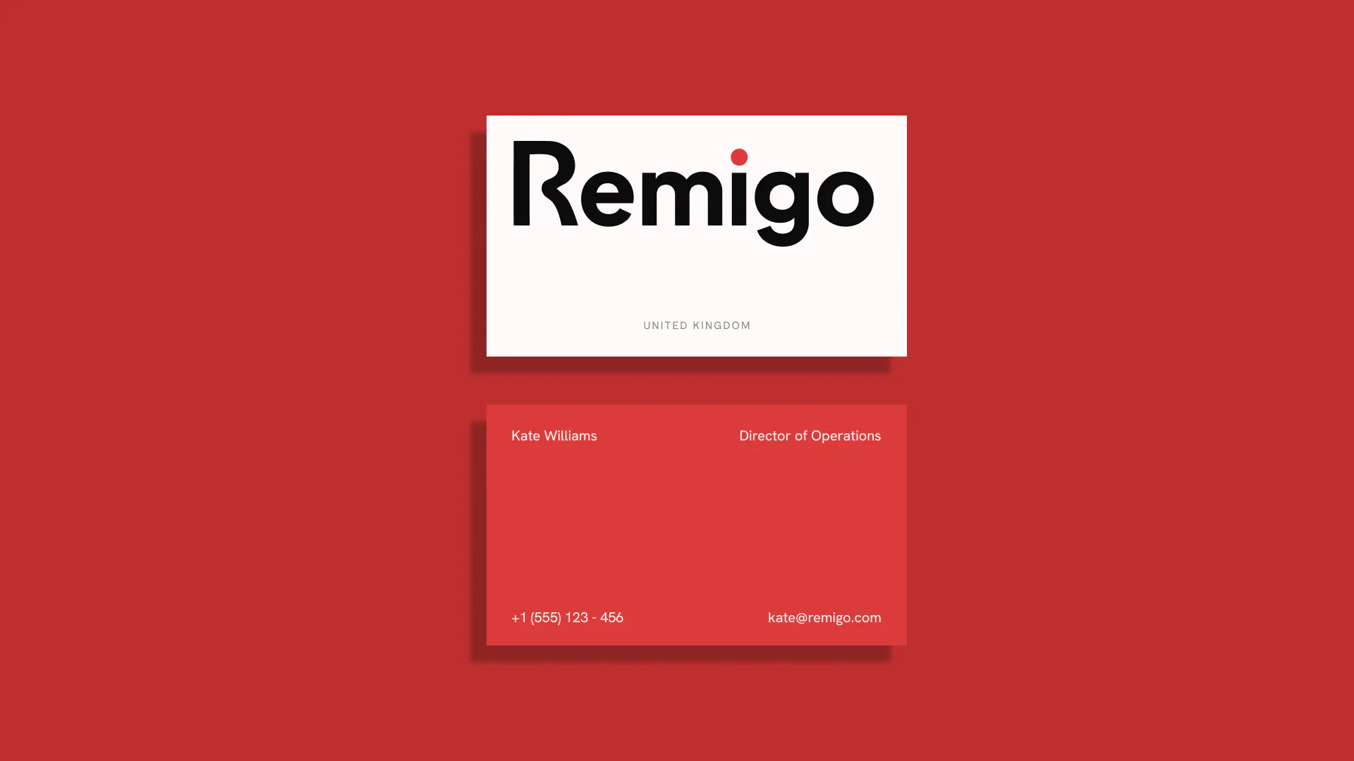 Remigo business card front and back on brand red