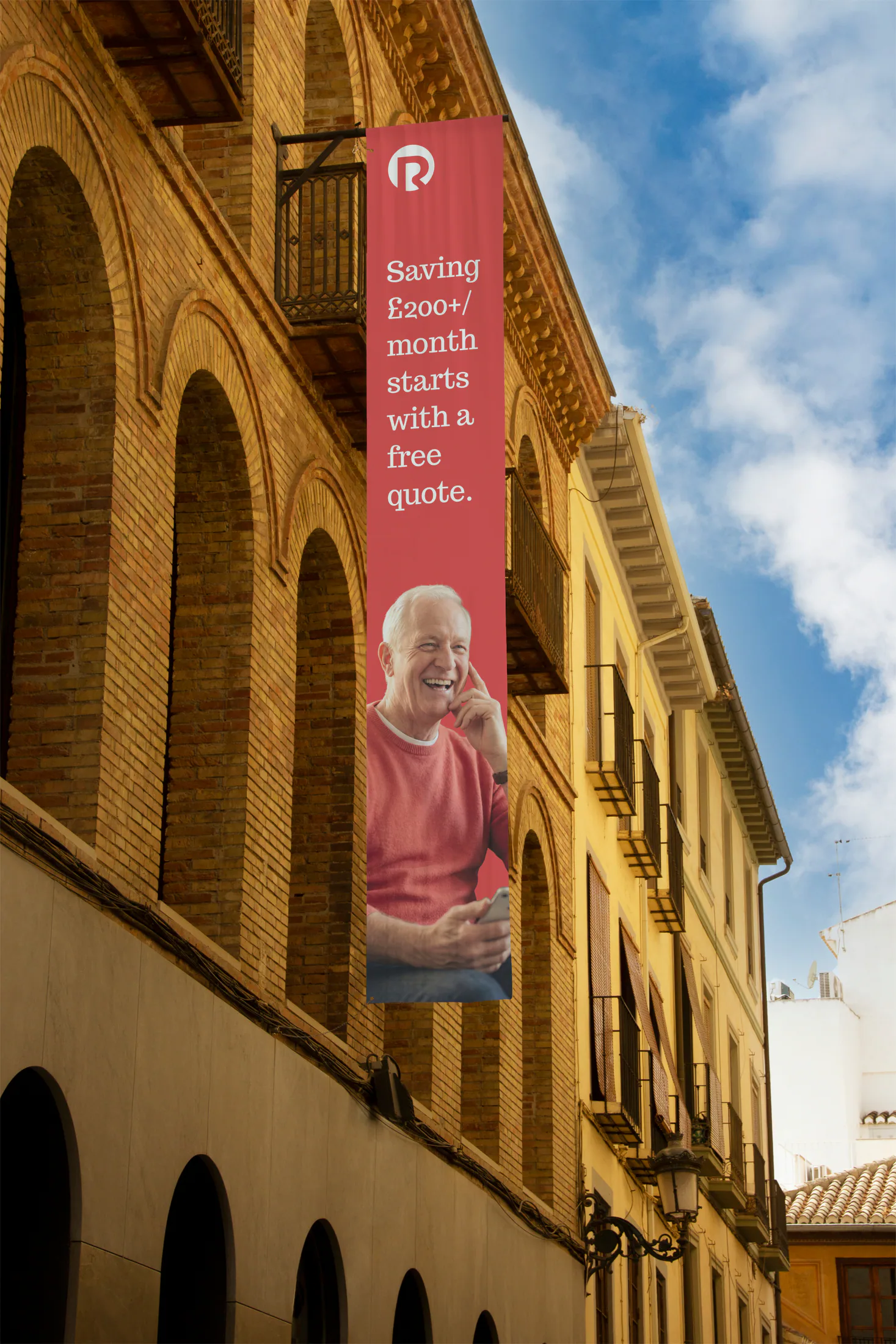 Remigo vertical banner hanging from a balcony